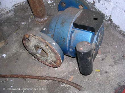 Asbestos Gasket Debris to Redudant Pump